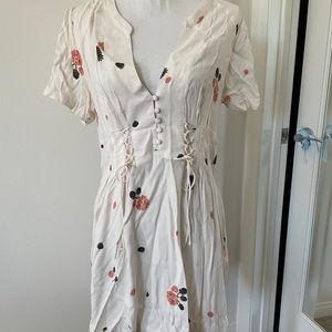 White mini dress with blackberry/floral print